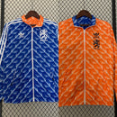 NETHERLANDS 24/25 REVERSIBLE WINDBREAKER – ORANGE & BLUE | KNVB GEAR